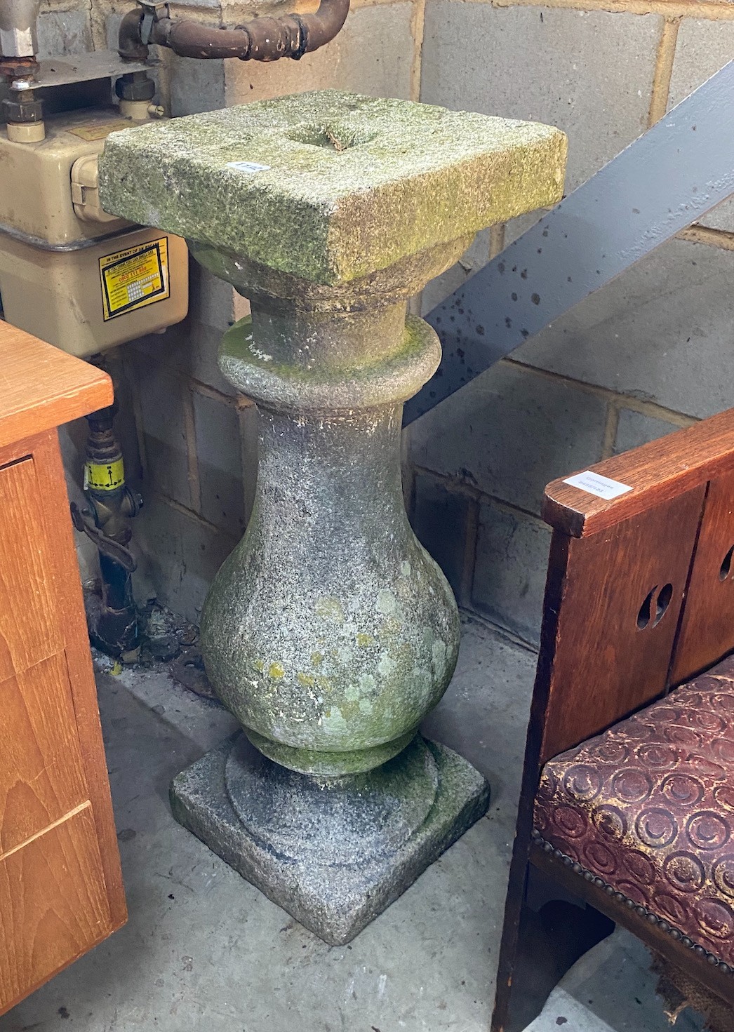 A carved stone baluster sun dial base, height 86cm